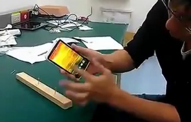 HTC One X Used As a Hammer (Video)