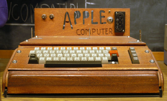 The Apple I computer in question, featuring a handmade wooden case.